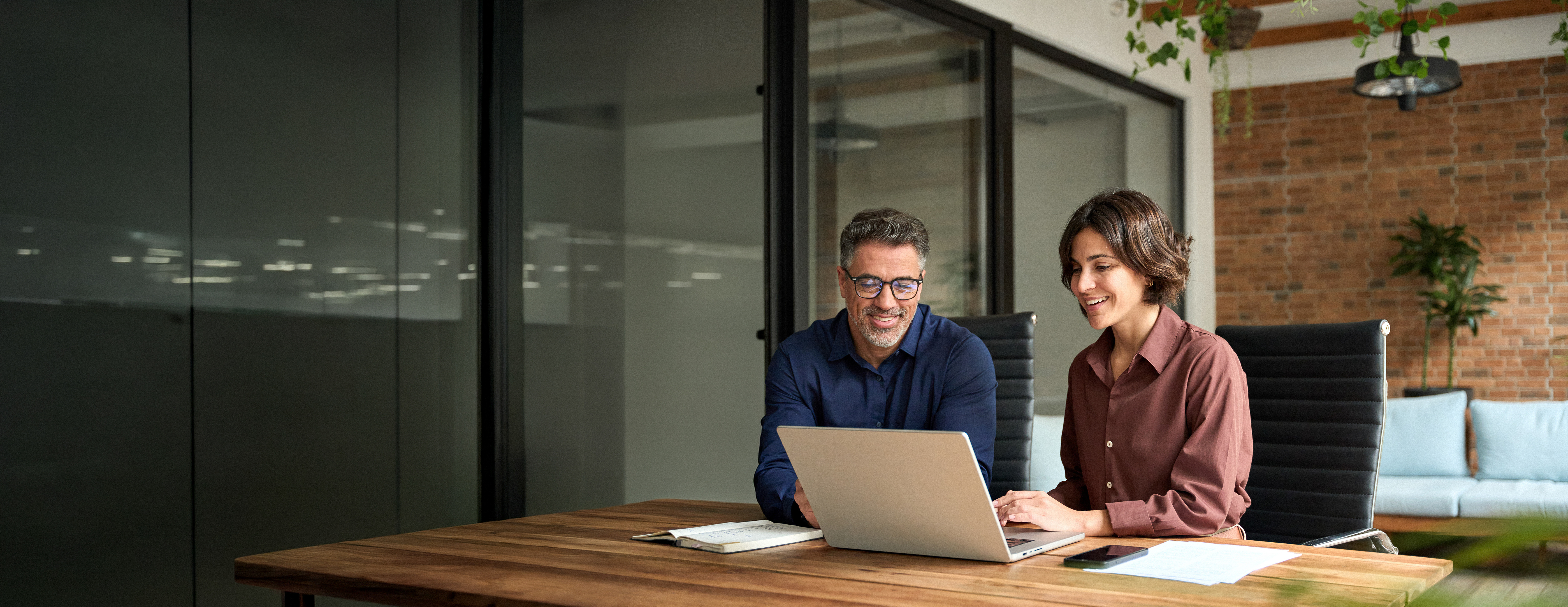 Consultores de BeDynamic trabajando con un cliente